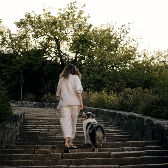 Woman Walking Upstairs